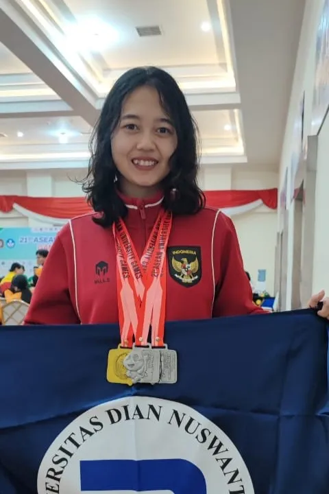 Evi Yuli Ana, Mahasiswi Udinus, Raih Prestasi Gemilang di AUG 2024